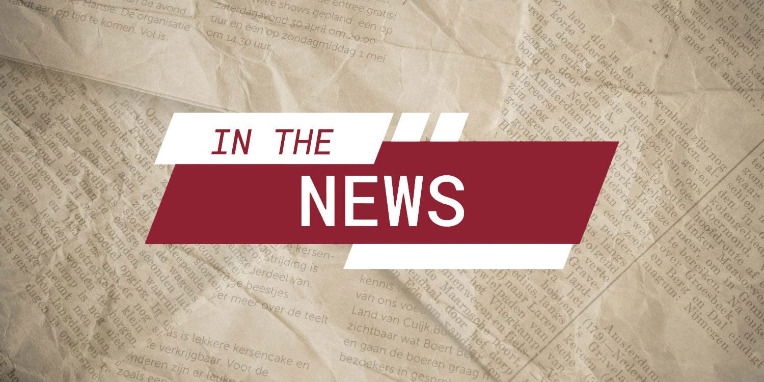 Graphic overlay "IN THE NEWS" on a newspaper background.
